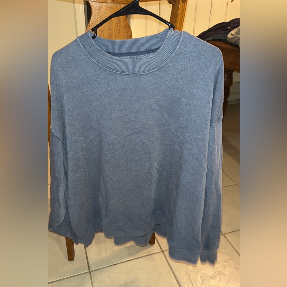 Blue American Eagle slightly distressed crew neck, size large